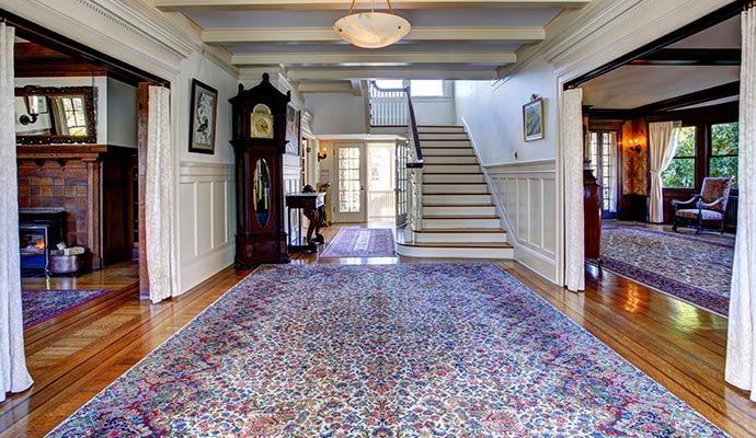 Elegant home interior featuring antique rug and classic design