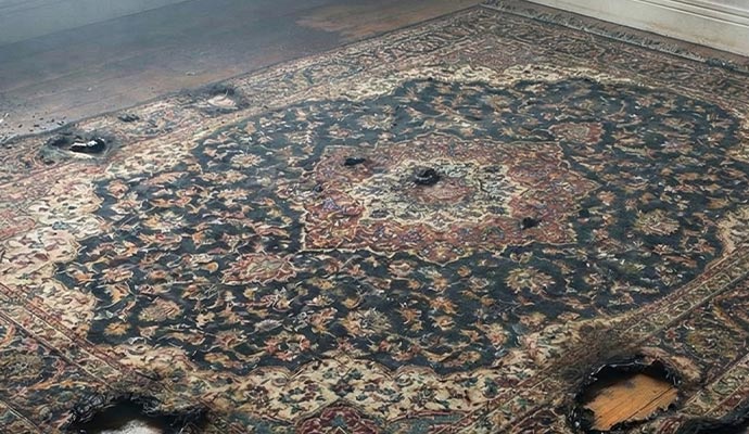 Fire damaged oriental rug