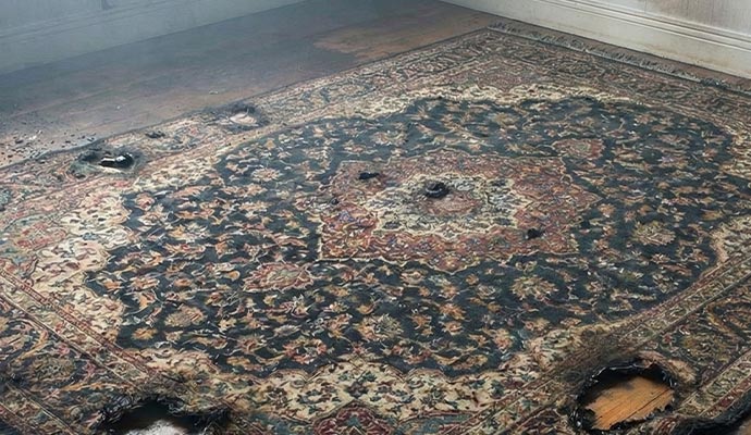 Fire damaged rug
