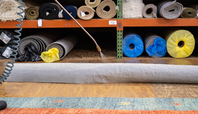 rolled rugs on storage