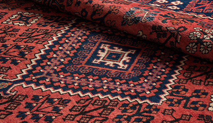Persian rug with diamond medallion pattern